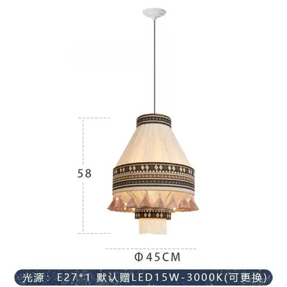 A cream-colored bohemian fringe pendant lamp with black geometric patterns and crystal-like tassels for dining room