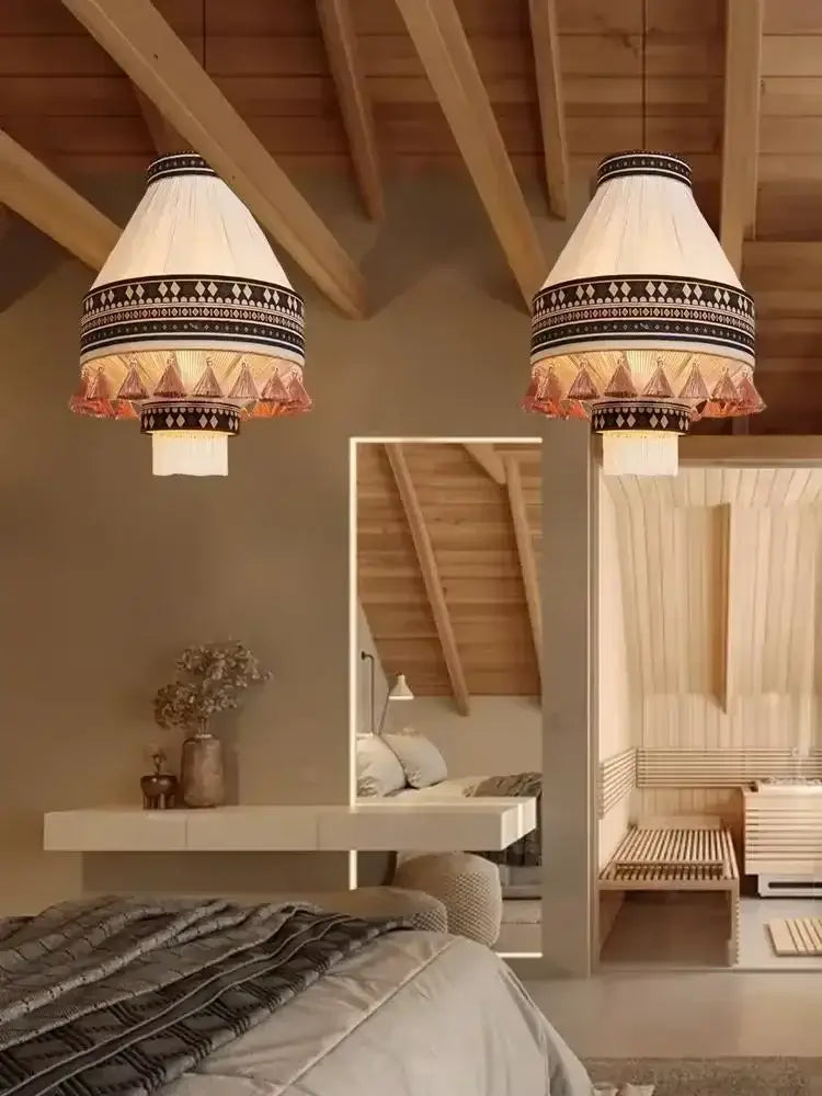 Two cream fabric hanging pendant lamps with black geometric patterns and tassels bohemian fringe pendant lamp
