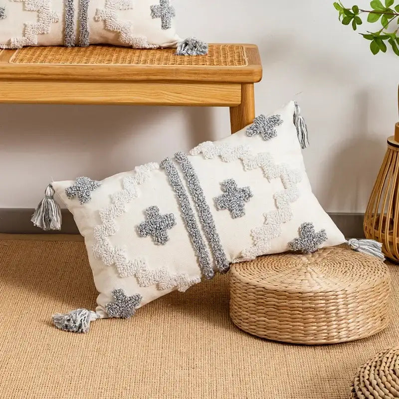 Cream-colored cushion cover with textured gray geometric tufted embroidery and tassels for living room decorbites pillow cover