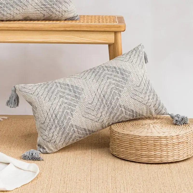 Gray and white geometric-patterned bohemian cushion cover with tassels cream and grey decorbites geometric tufted pillow cover