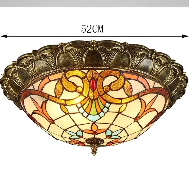 Bohemian glass ceiling light with bronze frame and amber stained glass panels in an ornate floral pattern decorbites ceiling light