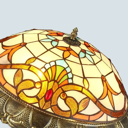 Tiffany-style bohemian glass ceiling light with amber stained glass floral patterns and copper leaded accents for decorbites