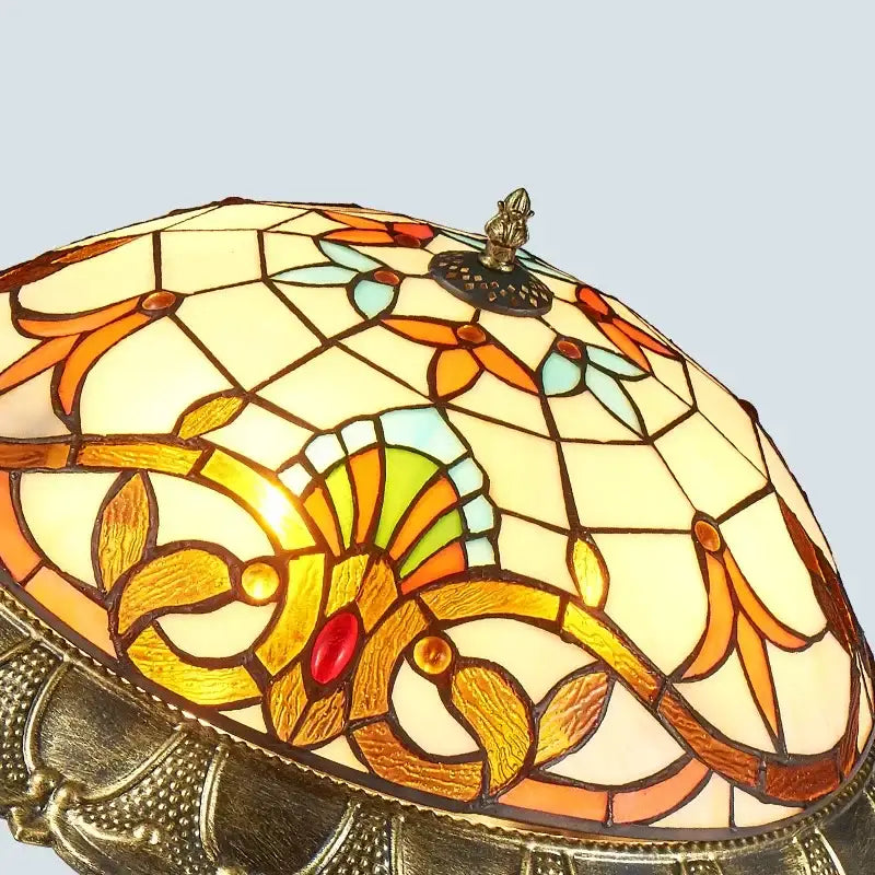 Tiffany-style bohemian glass ceiling light with amber stained glass floral patterns and copper leaded accents for decorbites