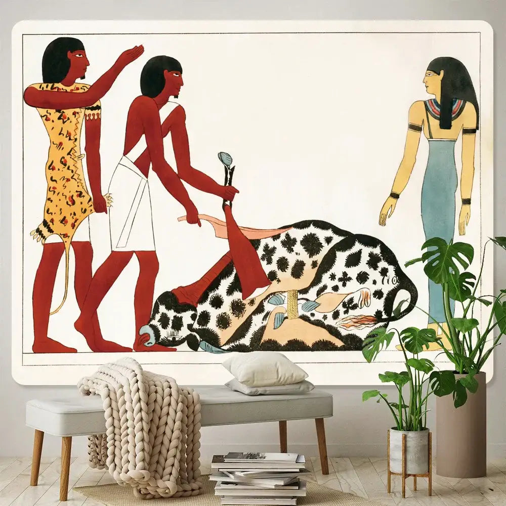 Bohemian gold and red egyptian mural tapestry featuring stylized figures and a black and white spotted animal centerpiece
