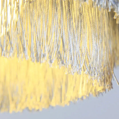 Bohemian gold tiered chandelier with shimmering yellow and silver fringe curtain for elegant bedroom decorbites bohemian gold decor