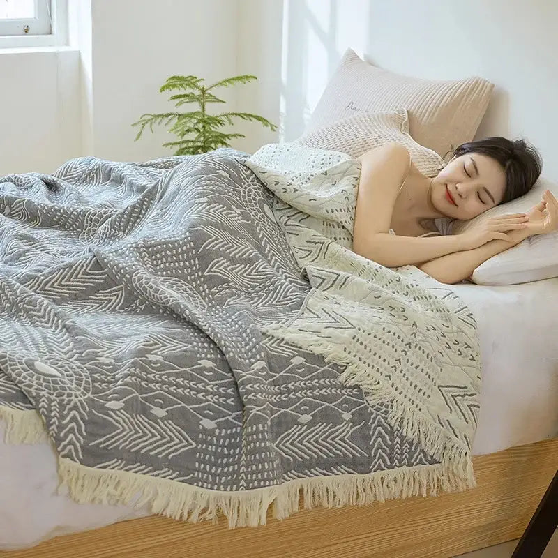Bohemian gray and white cotton throw blanket with geometric patterns and cream fringe for bedroom decorbites bohemian cotton throw