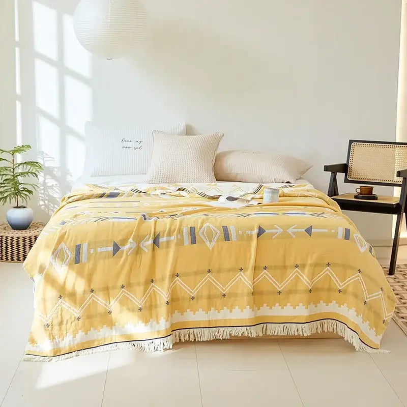 Yellow throw blanket with white and gray geometric patterns fringed edge bohemian cotton throw by decorbites