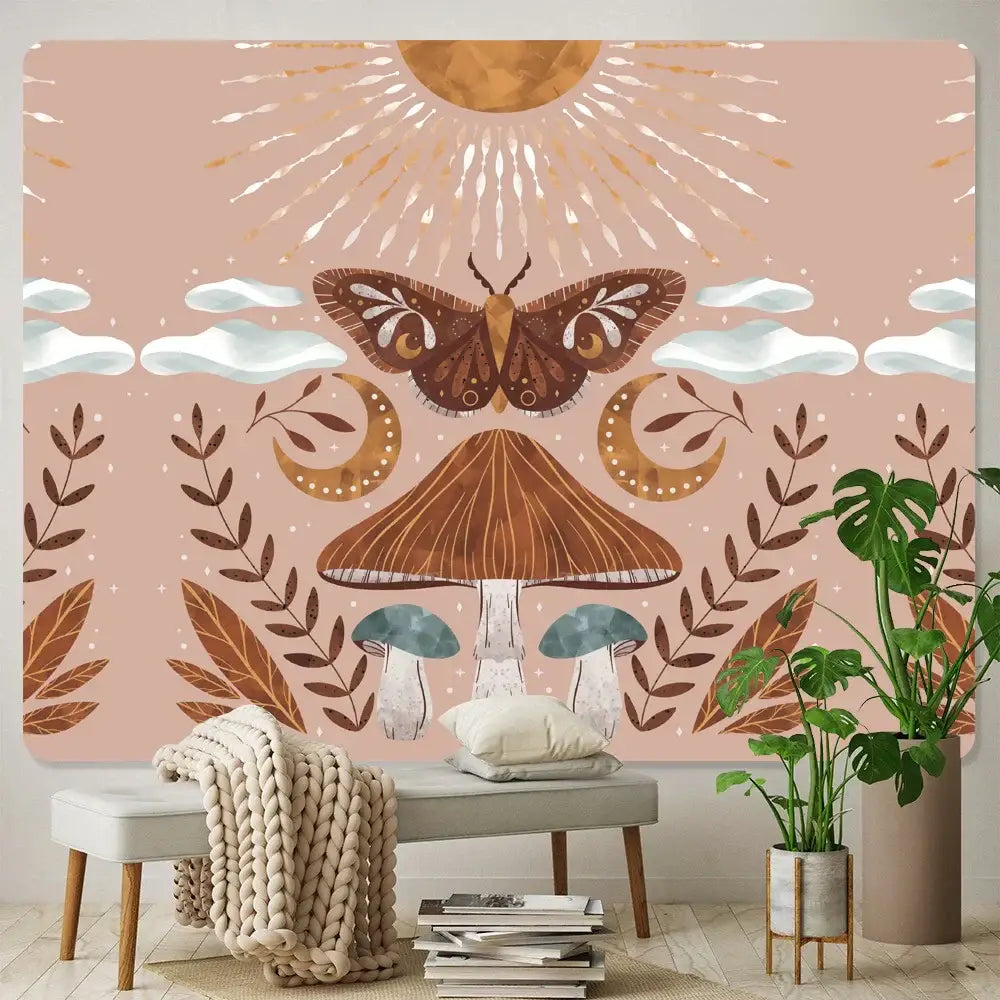 A soft pink bohemian home art tapestry featuring a stylized brown moth mushrooms and celestial motifs for decorbites bohemian home