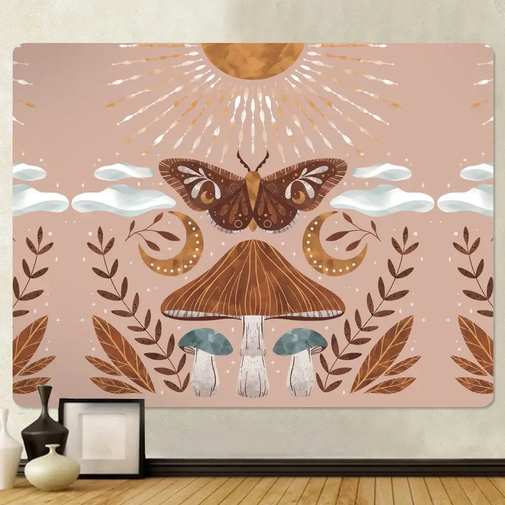 A soft pink bohemian home art tapestry featuring a brown moth mushrooms and celestial motifs for decorbites bohemian home