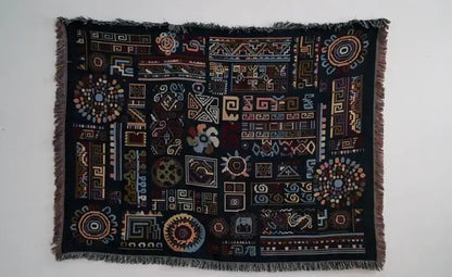 Black woven decorbites bohemian jacquard throw blanket with multicolored geometric embroidery and fringed edges for living room