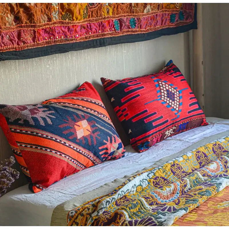 Vibrant bohemian jute linen pillow covers in bold red and blue geometric patterns for living room decorbites bohemian jute