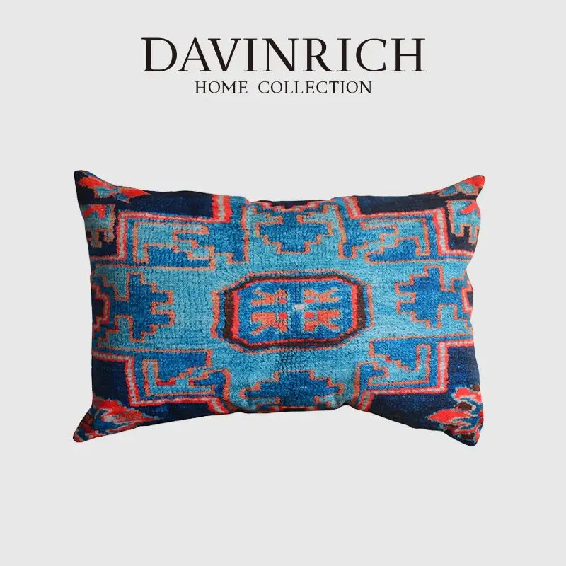 A rectangular bohemian jute linen pillow cover with blue and red geometric pattern from decorbites bohemian jute