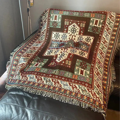 Decorbites bohemian knit throw blanket with red and blue geometric pattern and fringed edges for living room decor