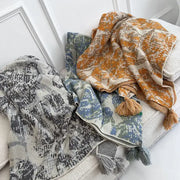 Three decorbites bohemian knitted blankets with earthy tones, tassels, and abstract patterns for bedroom throw decor