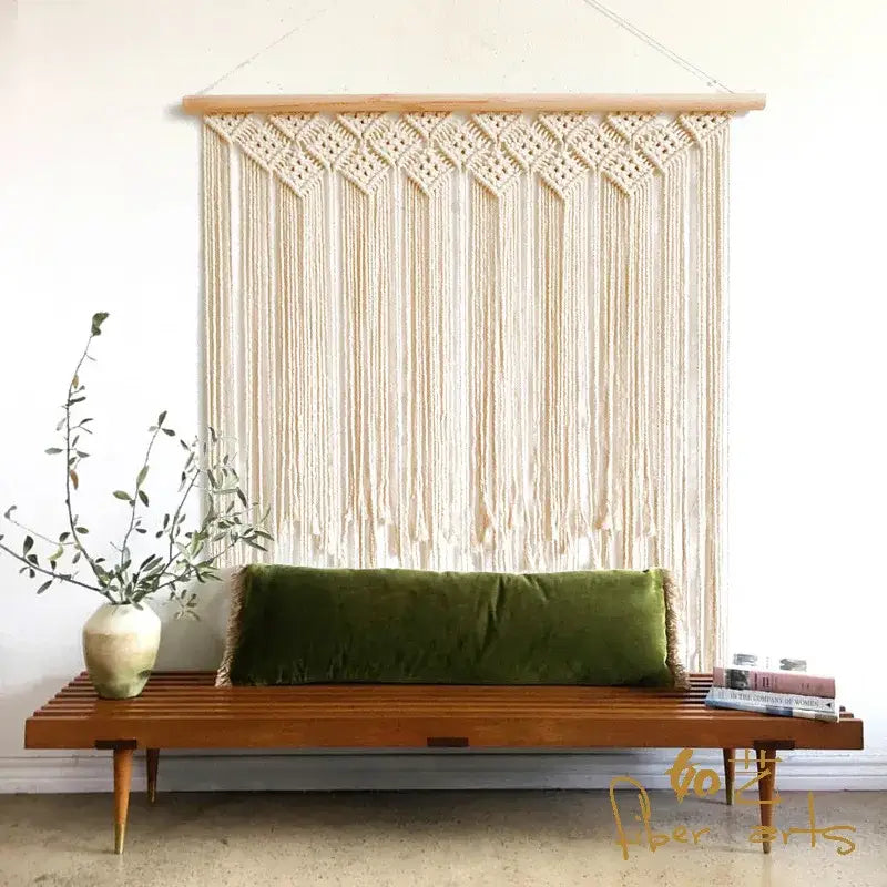 Beige decorbites bohemian macrame curtain tapestry with wooden top bar and intricate diamond-patterned knots for wall decor