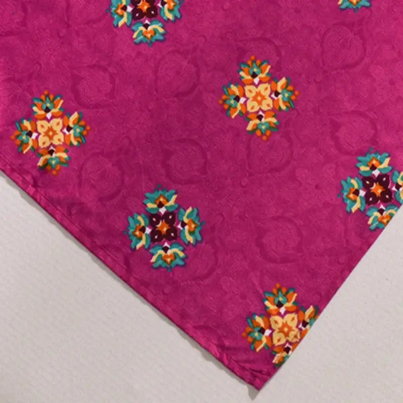 Vibrant magenta silk scarf with colorful ethnic print floral motifs in orange teal and brown for decorbites bohemian ethnic decor