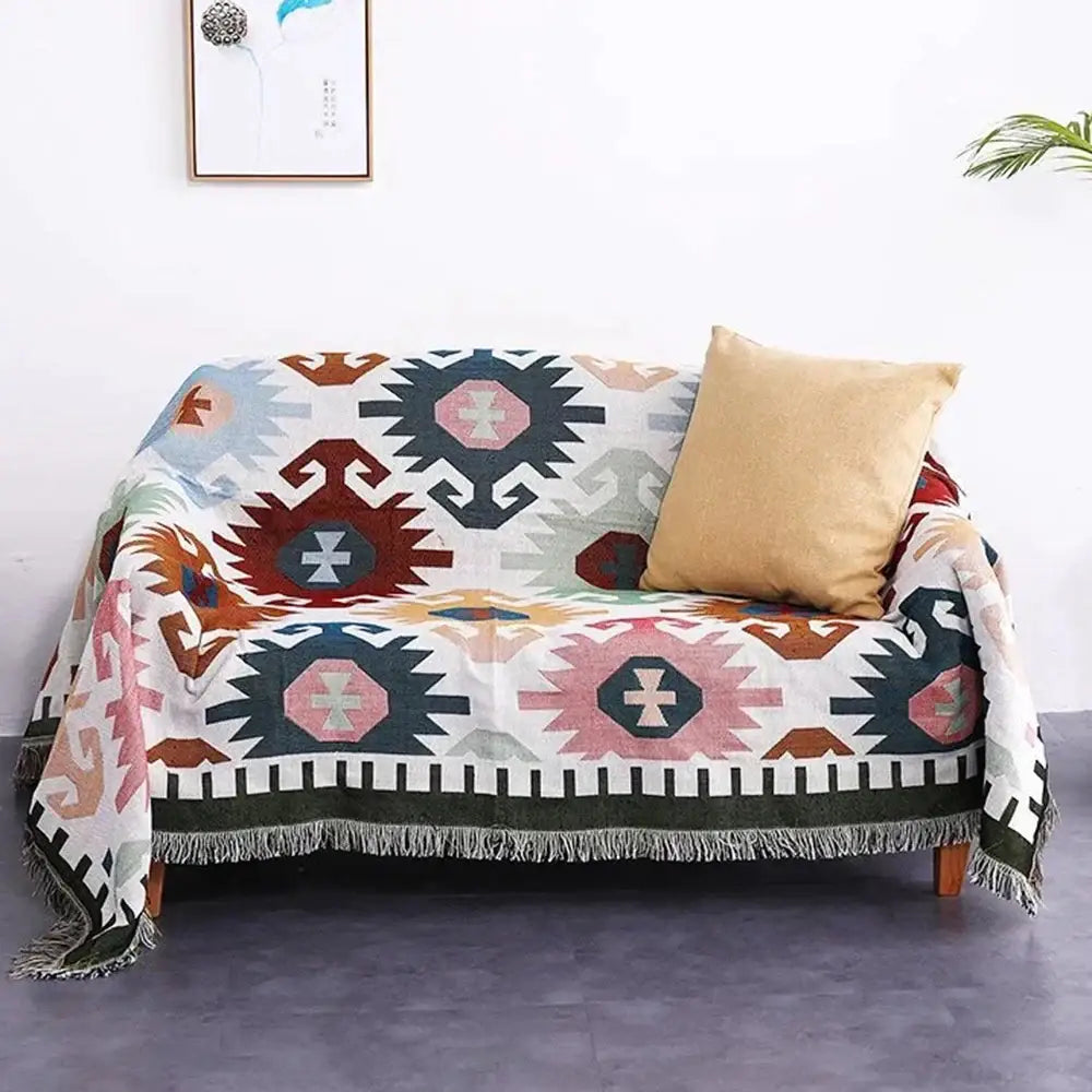 Bohemian multicolored geometric tassel sofa cover with fringed edges and beige pillow for living room decorbites geometric tassel