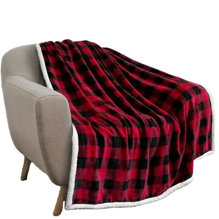 Red and black plaid fleece sofa blanket with white sherpa lining ideal for winter coral fleece living room use