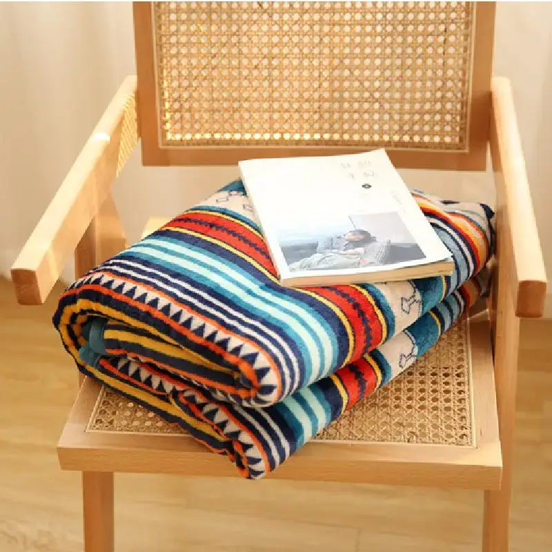 Bohemian multicolored striped coral fleece sofa blanket with bold stripes and black triangles for winter comfort