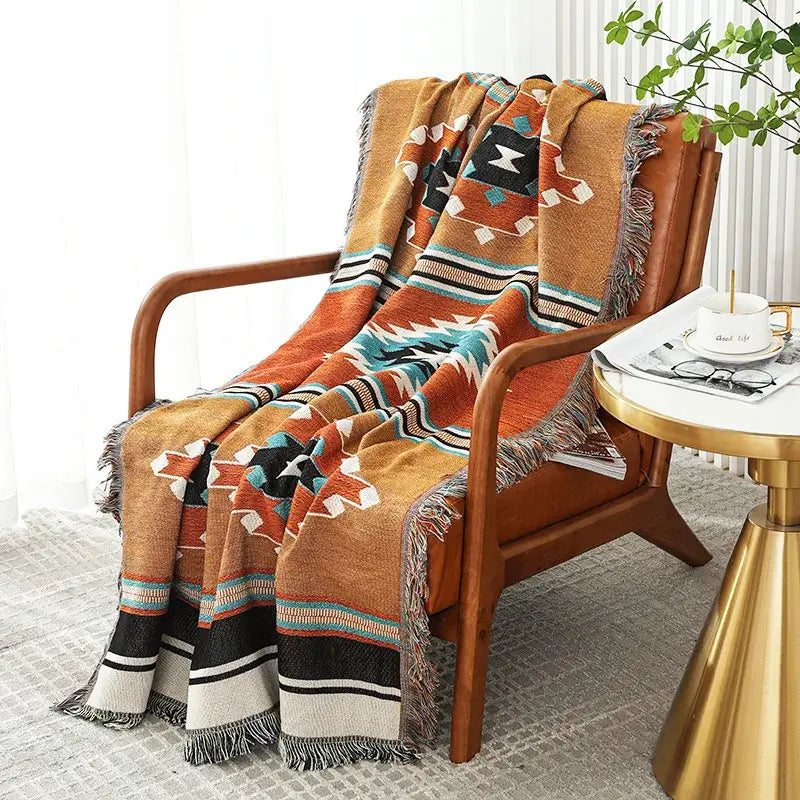 Cozy decorbites bohemian throw blanket with vibrant orange teal geometric pattern and fringed edges for bedroom decor