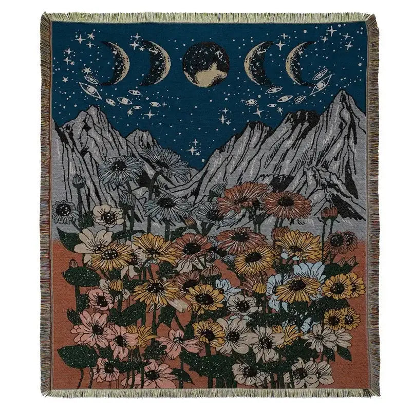 Bohemian outdoor blanket by decorbites featuring a woven gray tiger tapestry with colorful flowers and moon phases decor
