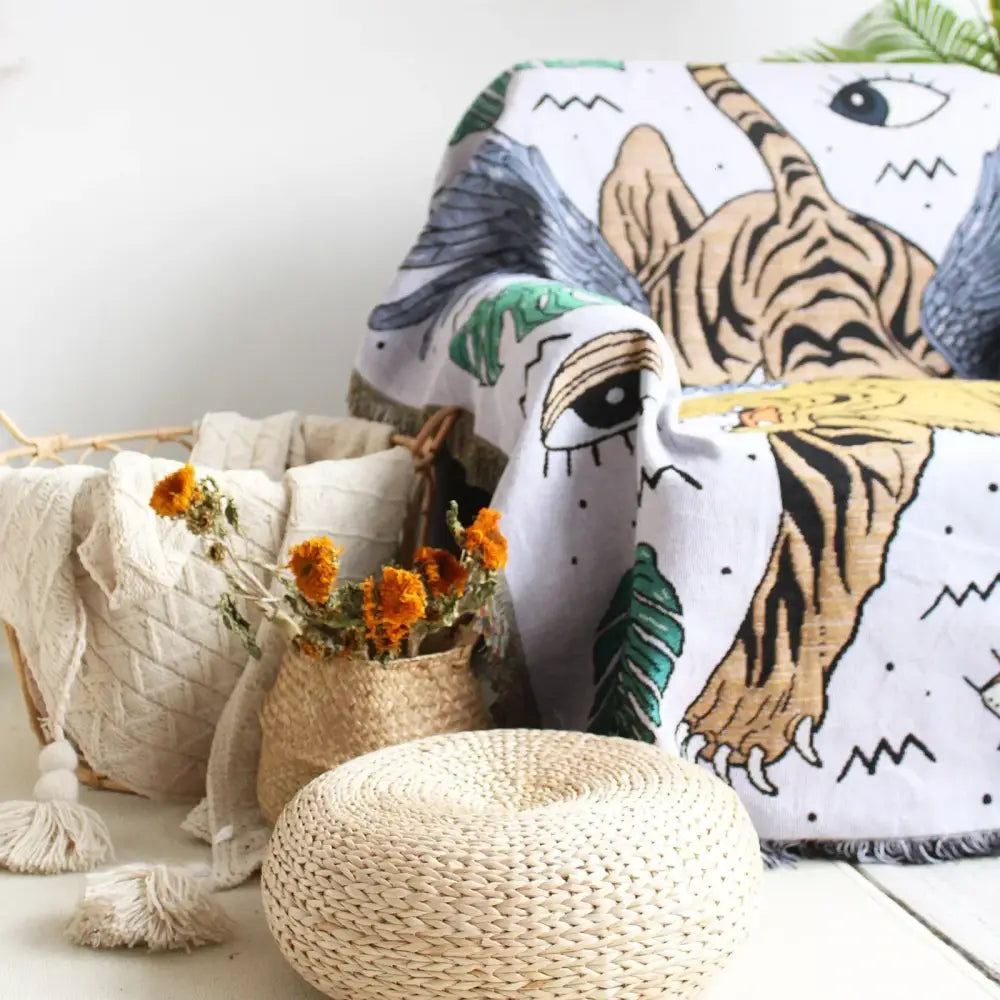 Bohemian outdoor blanket by decorbites featuring a white throw with black and tan tiger illustrations and green foliage accents