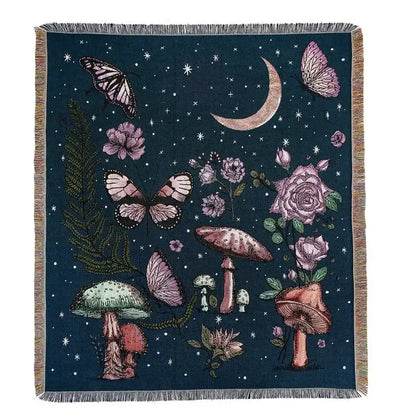 A dark teal decorbites bohemian outdoor blanket with pink butterflies and a crescent moon on starry night sky design