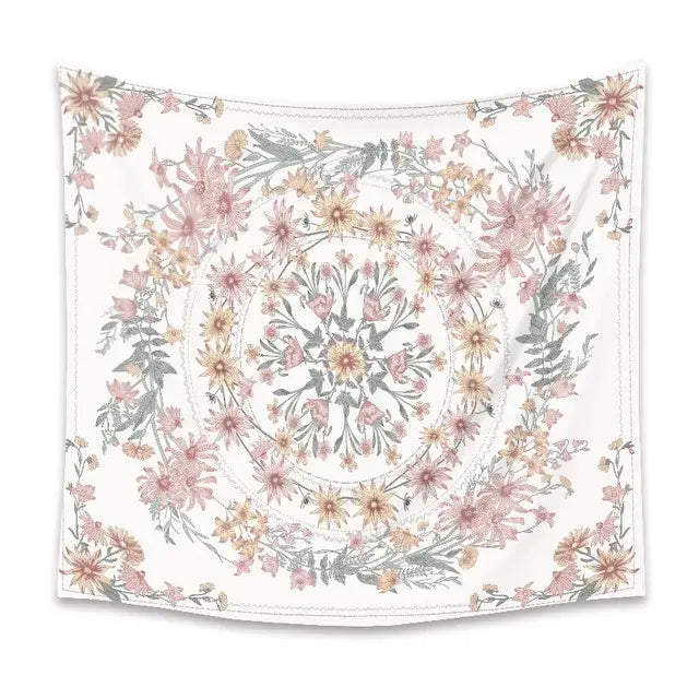 A delicate white wall hanging with a bohemian mandala flower design in pink green for bedroom decor by decorbites