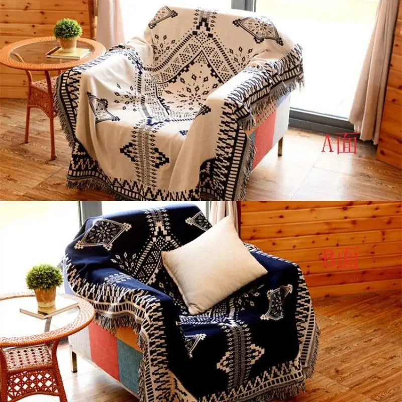 Bohemian pink and red decorbites knitted cotton throw blanket with black and white geometric pattern and navy reverse