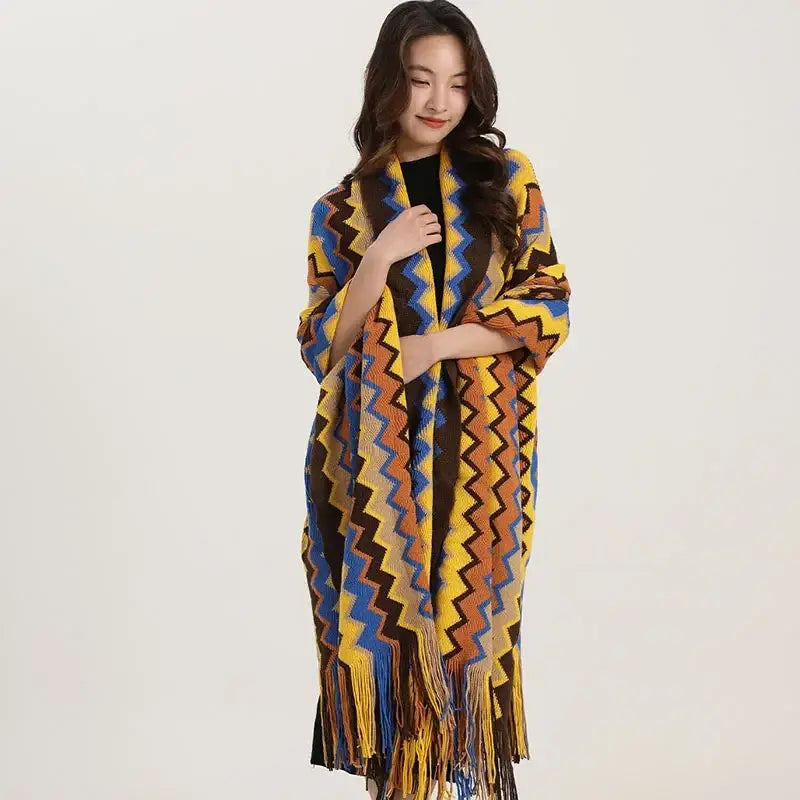 Vibrant yellow blue and brown knit wavy fringe shawl with zigzag pattern and fringe detailing for living room use