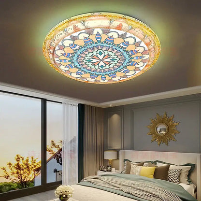 Circular ceiling lamp with intricate pastel blue pink and gold mandala design from decorbites bohemian romantic art collection