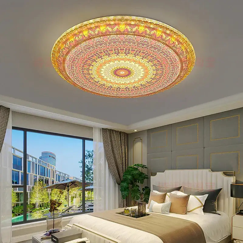 Ornate circular ceiling lamp with intricate mandala design in warm gold pink and cream tones decorbites bohemian romantic art