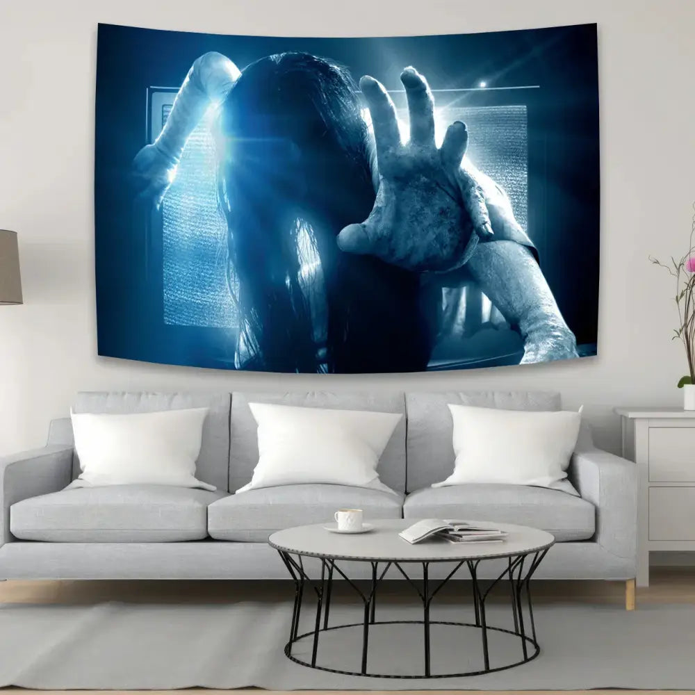 Blue bohemian sadakos wall tapestry features a horror-themed figure reaching through a window with textured fabric decorbites