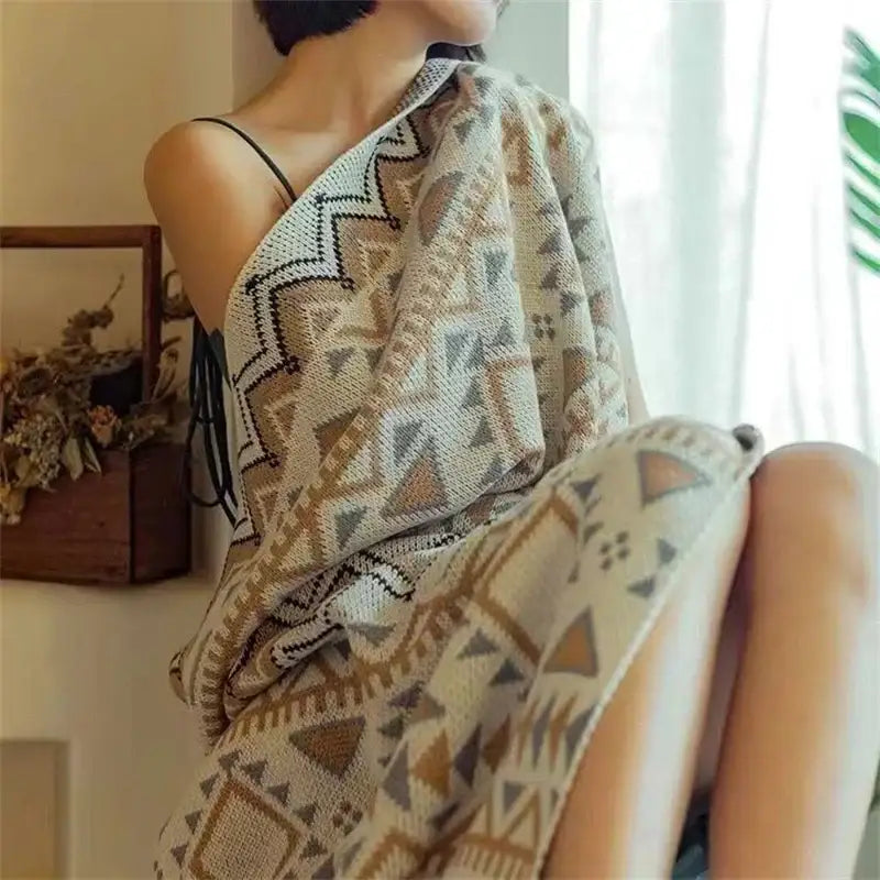 A cozy off-white bohemian striped knit throw blanket with beige and brown geometric patterns for living room decorbites bohemian striped decor
