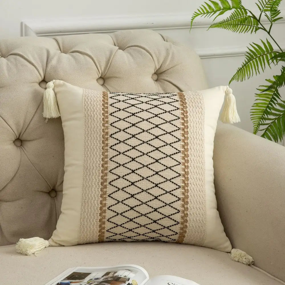 Cream-colored pillow cover with black diamond woven panel beige stripes and tassels decorbites bohemian style fringed