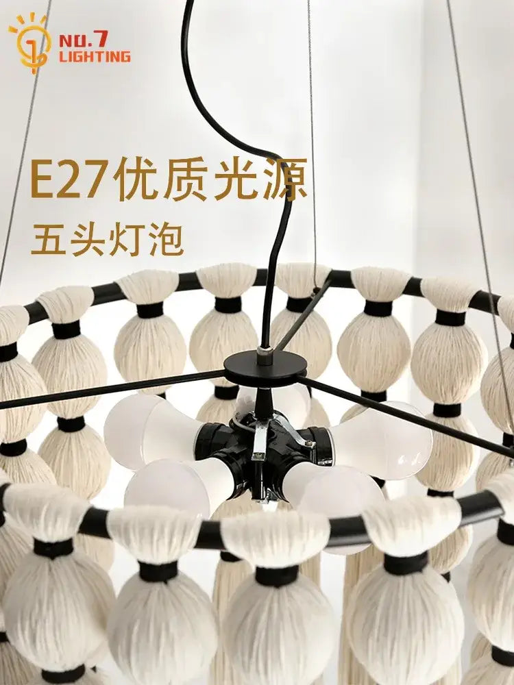Black metal bohemian tassel pendant led light with five white yarn wrapped bulbs for decorbites bohemian tassel decor