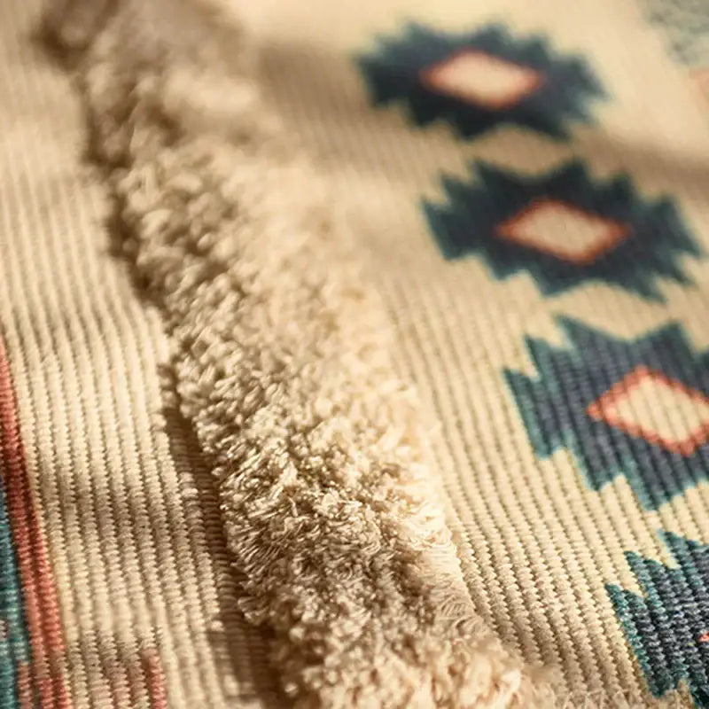 Beige corduroy bohemian tassel rug with plush fuzzy lining and teal rust geometric patterns by decorbites bohemian