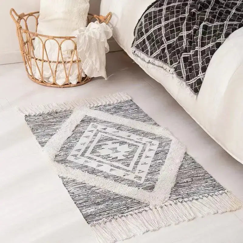 Gray and white geometric-patterned decorbites bohemian tassel rug with fringed edges for living room decor