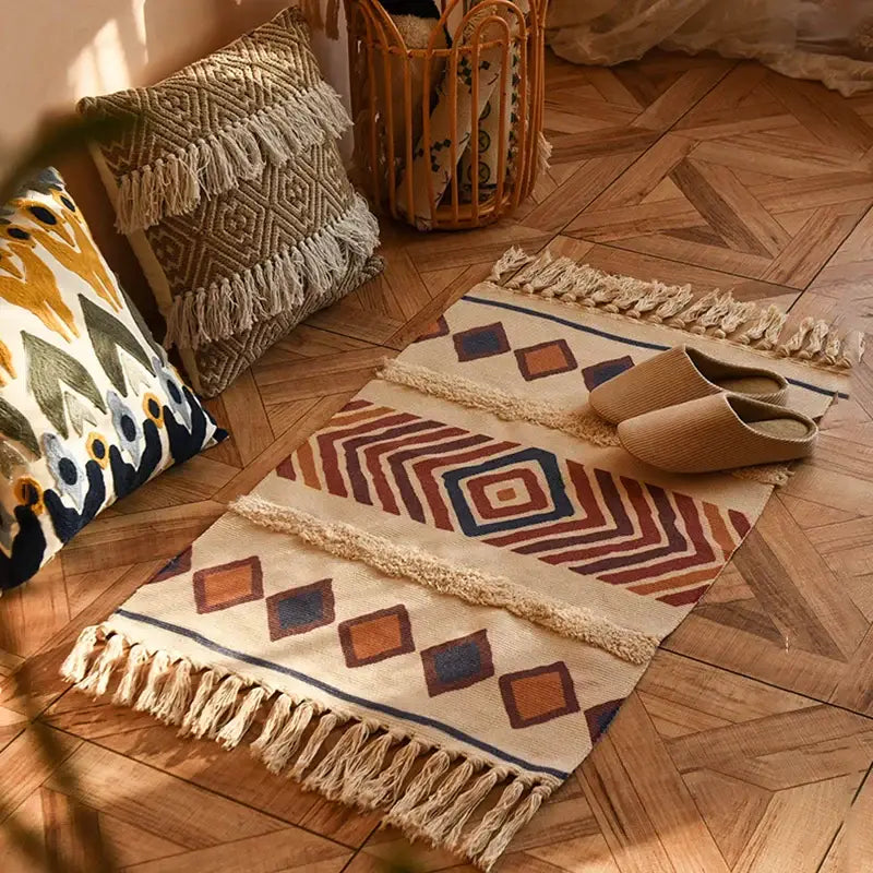 Beige woven decorbites bohemian tassel rug with rust navy blue geometric patterns and fringed edges for living room decor