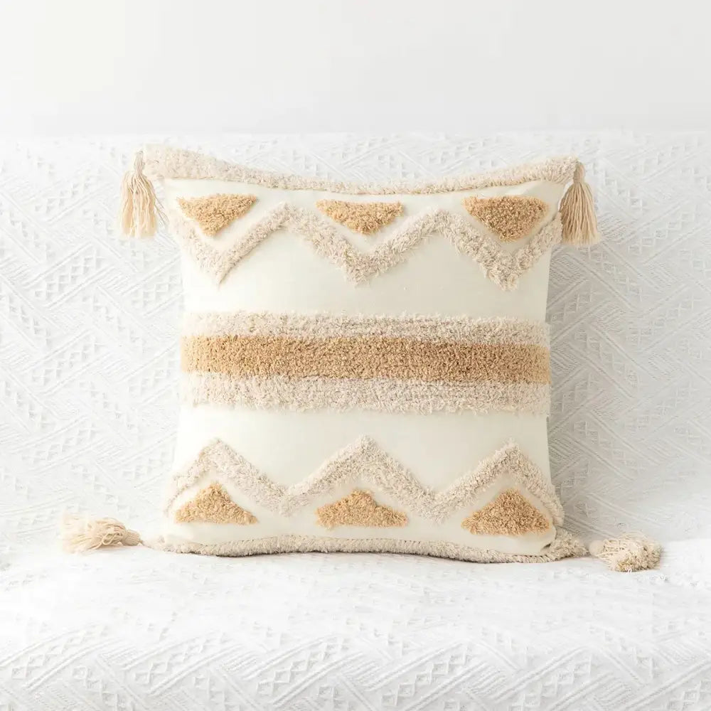 Cream-colored decorbites bohemian tufted tassel pillow case with textured beige geometric patterns for living room decor