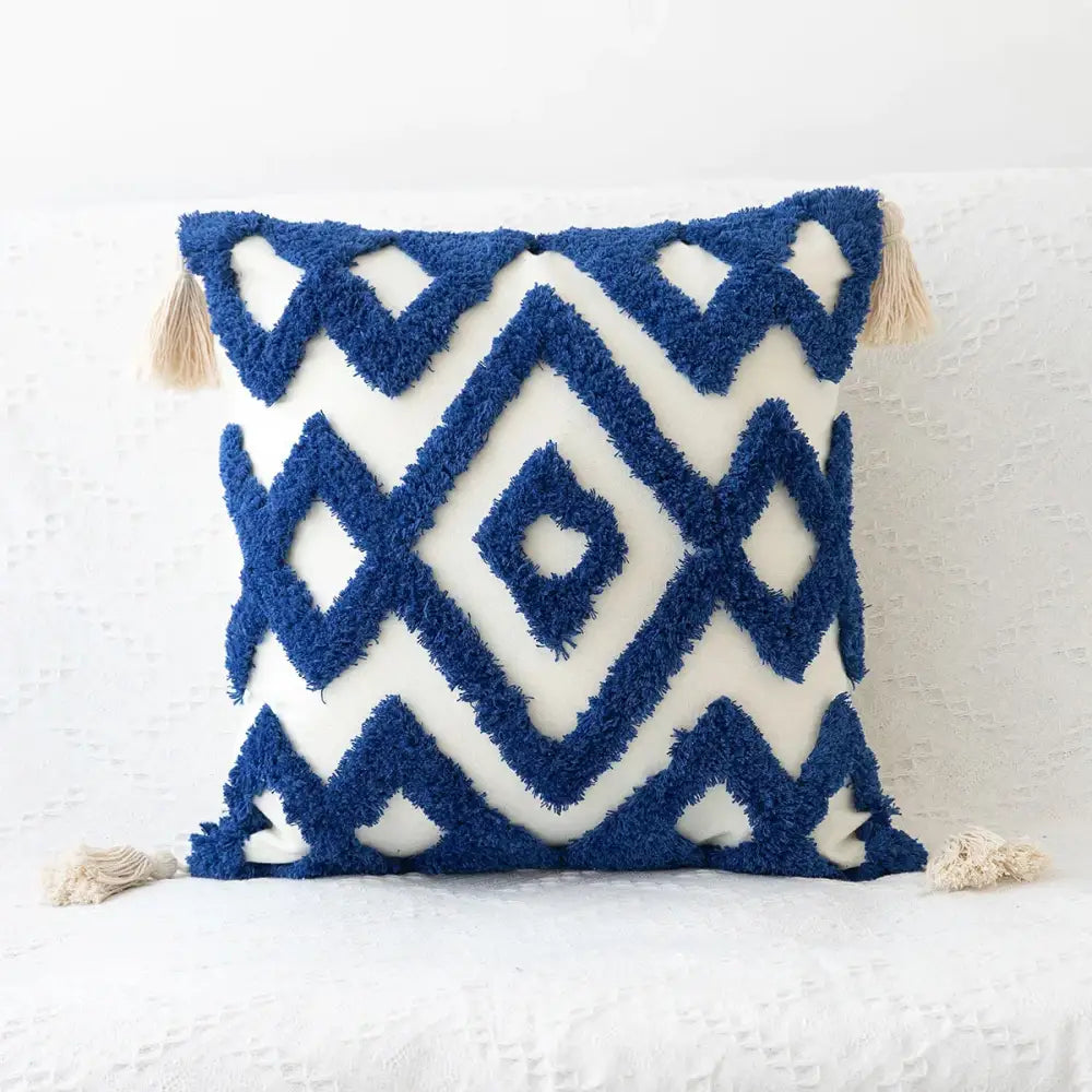 Bohemian tufted tassel pillow with blue and white geometric pattern and textured tassels for living room decorbites