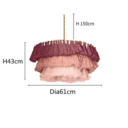 A decorbites bohemian vintage fela pendant light with tiered burgundy dusty rose and blush pink tassels for bedroom decor