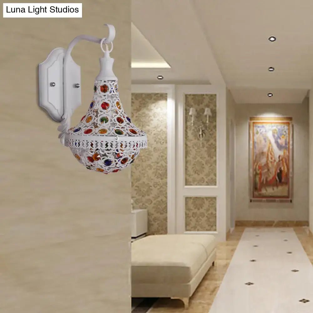 Bohemian white finish mosaic wall sconce with intricate cut-out patterns and colorful glass inlays for bedroom lighting