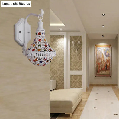 Bohemian white finish mosaic wall sconce with intricate cut-out patterns and colorful glass inlays for bedroom lighting