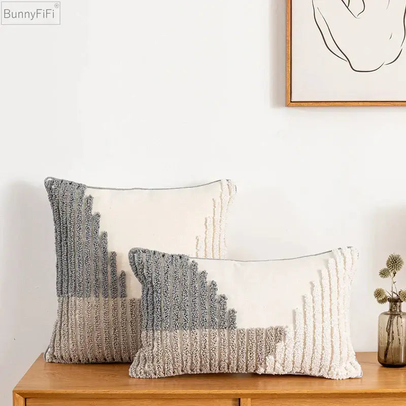 Two rectangular cushion covers with textured stacked vertical ribbing in grey and cream for home decoration boho style
