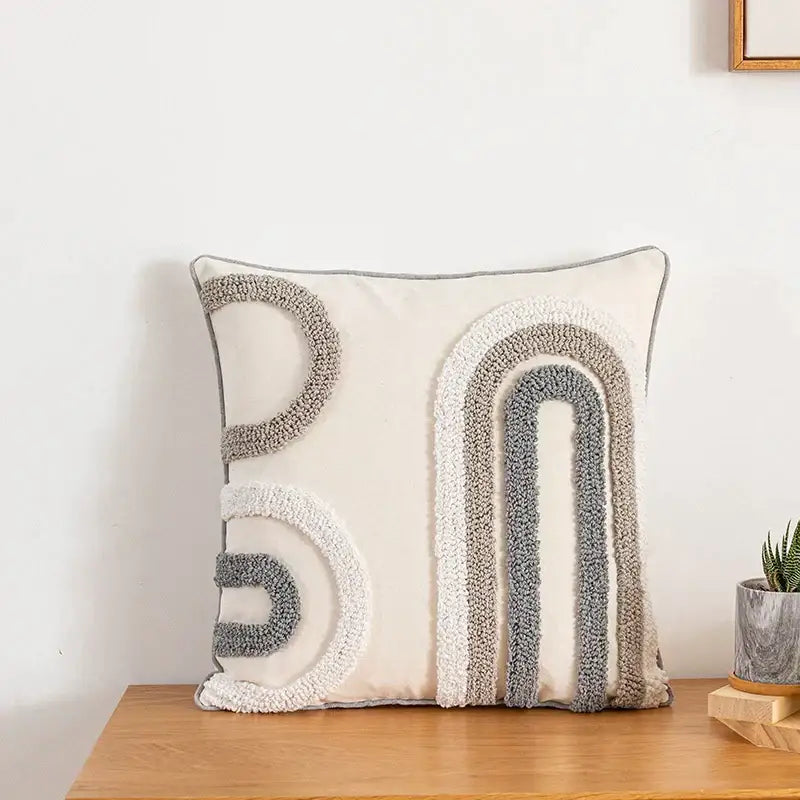 Cream-colored cushion cover with textured layered gray and white arches for home decoration decorbites boho style