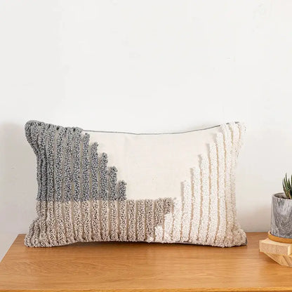 Rectangular cushion cover with textured tufted vertical stripes in gray and cream tones for home decoration decorbites boho style