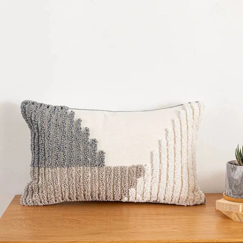 Rectangular cushion cover with textured tufted vertical stripes in gray and cream tones for home decoration decorbites boho style