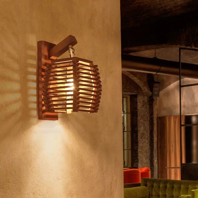 Warm-toned bamboo wall sconce with woven basket design, ideal as a boho corridor wall sconce light