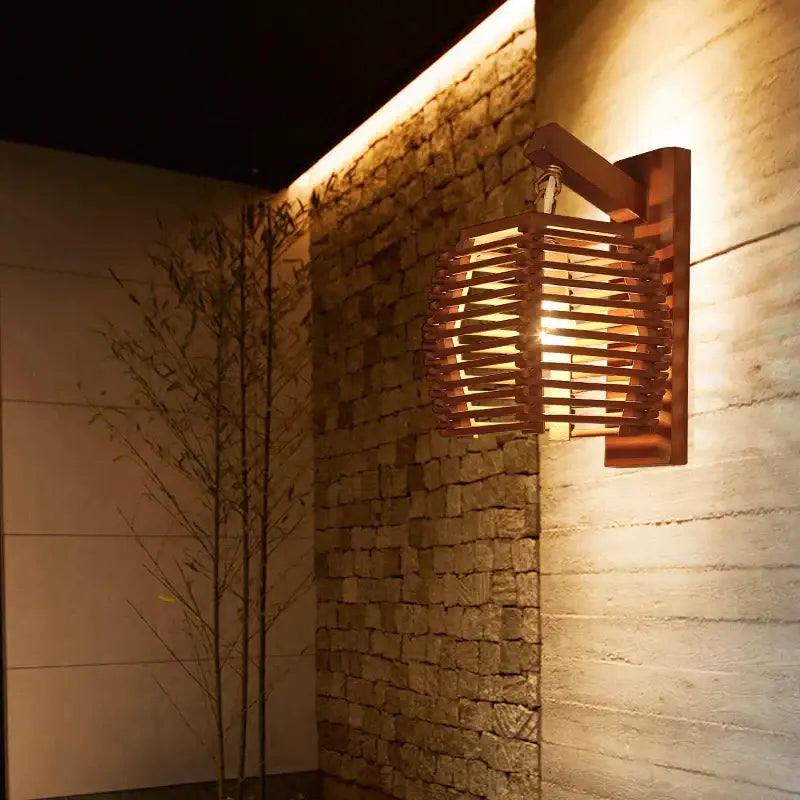 Warm-toned bamboo wall sconce light with woven lattice design ideal for boho corridor decor